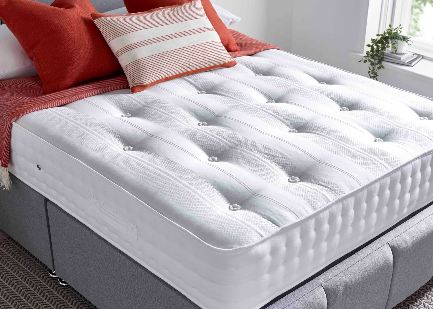 Orthopaedic pocket sprung mattress designed for firm support, spinal alignment and pressure relief