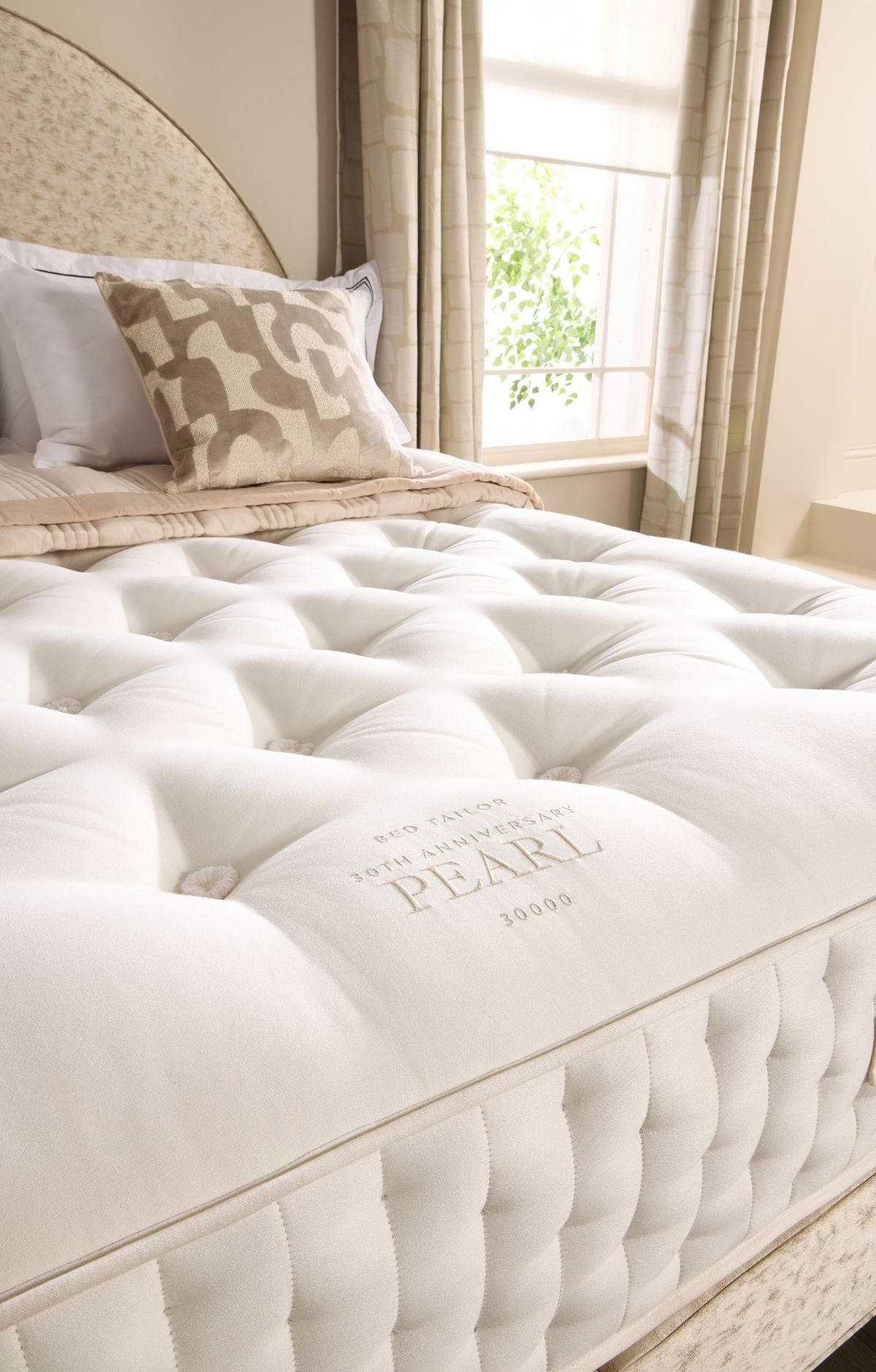 Harrisons Pearl mattress with 30000 pocket springs, handcrafted luxury design and superior body support
